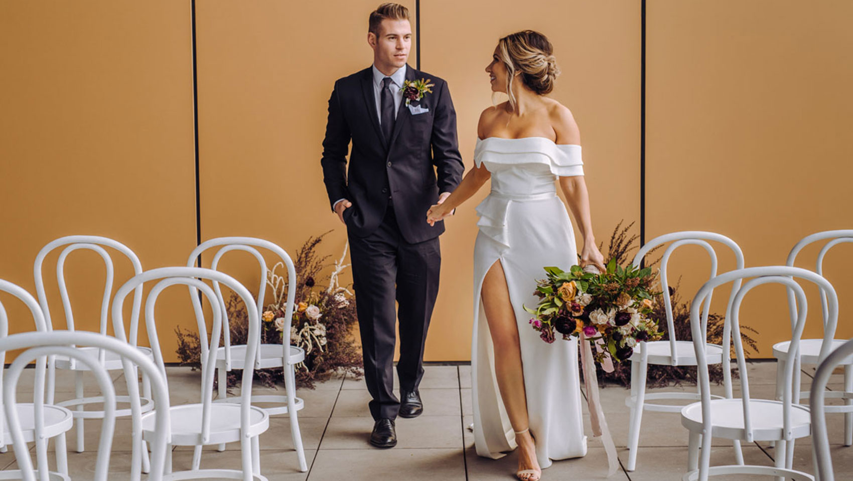 Bride & Groom Walk Among Ceremony Seating