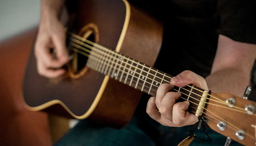 guy playing guitar