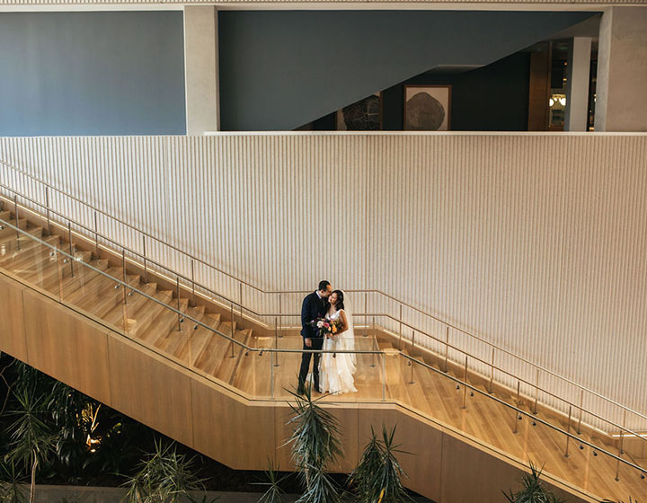 bride and groom on stairs