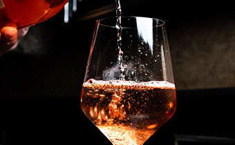 Wine being poured in a glass